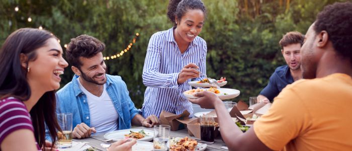 Friends eating outdoors