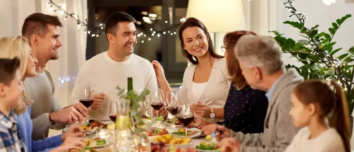 Family eating Holiday dinner